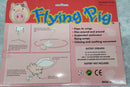 VINTAGE BATTERY-POWERED FLYING PIG TOY