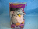 1998 Tiger Electronics Pink-Bellied Spotted Plush with Green Eyes Model 70-800
