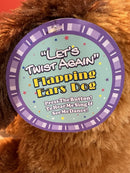 Interactive Singing Dog with Flapping Ears and Twistable Features