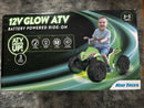 Kid Trax 12V Green Glow ATV Ride-On with LED Lights for Ages 3-5