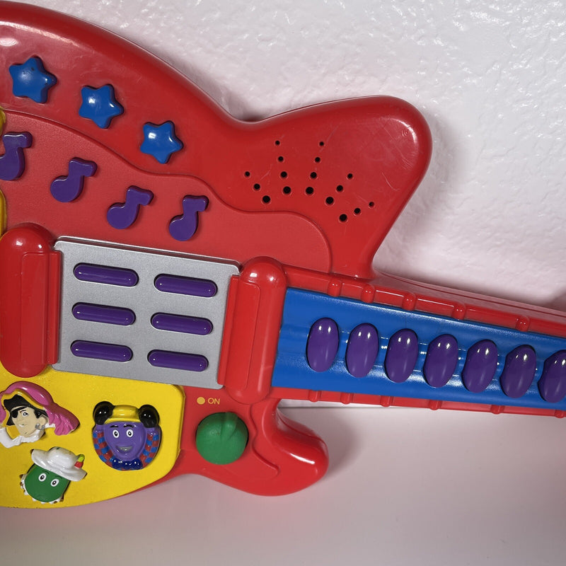 Red Spin Master Musical Guitar Toy 2003