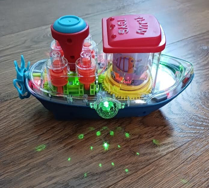 Plastic Bump N Go Tugboat Toy with Lights, Movement, and Music