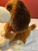 Interactive Singing Dog with Flapping Ears and Twistable Features