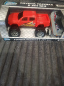 Turbo Wheels 1:28 Scale Toyota Tacoma with Red Jet Ski
