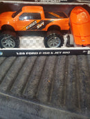 Turbo Wheels 1:28 Scale Ford F-150 with Jet Ski Trailer in Vibrant Orange