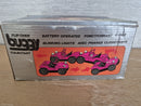 Classic Black Battery-Operated Tumble Buggy with Blinking Headlights and Original Box