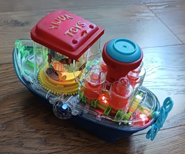 Plastic Bump N Go Tugboat Toy with Lights, Movement, and Music