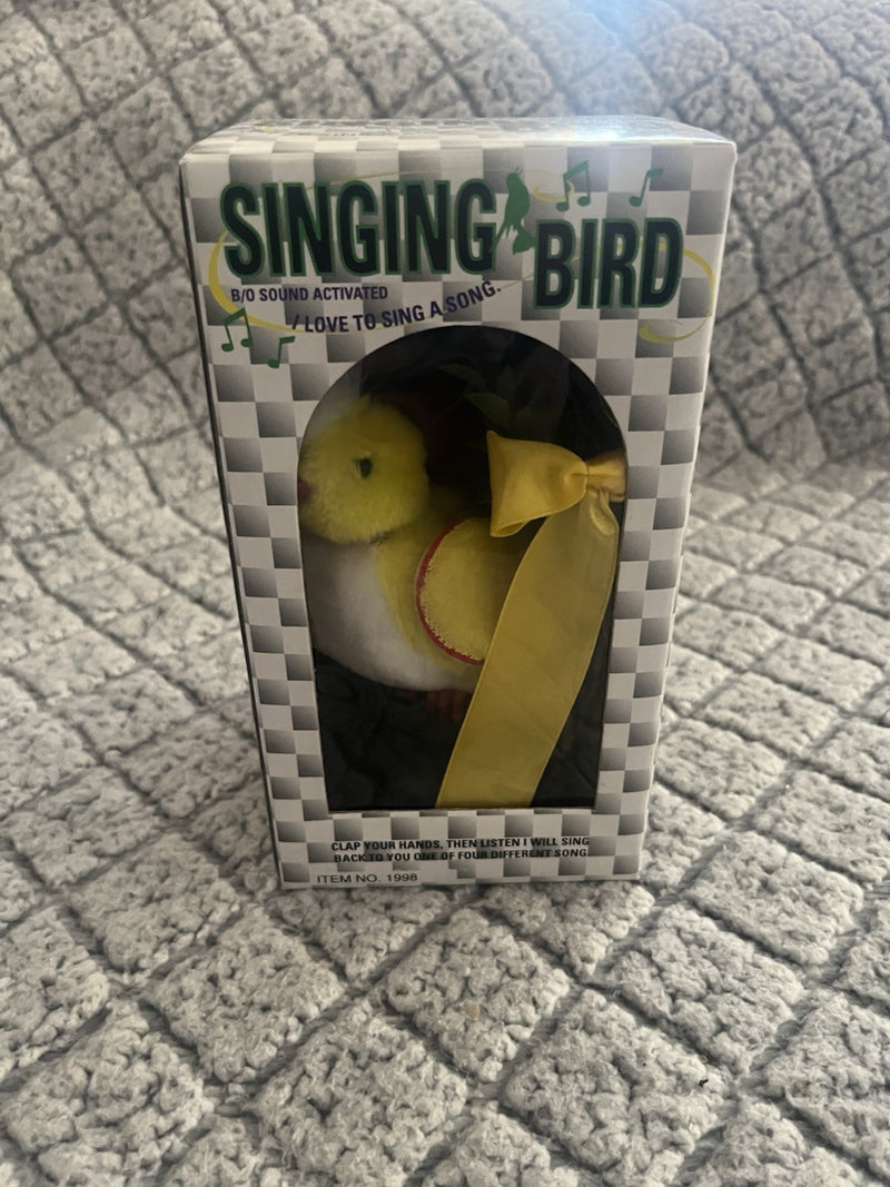 Battery-Operated Yellow Singing Bird Toy with Clap-Activated Sound, Chain, and Perch