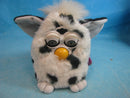 1998 Tiger Electronics Black & White Spotted Plush with Green Eyes Model 70-800