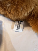 Interactive Singing Dog with Flapping Ears and Twistable Features