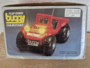 Classic Black Battery-Operated Tumble Buggy with Blinking Headlights and Original Box