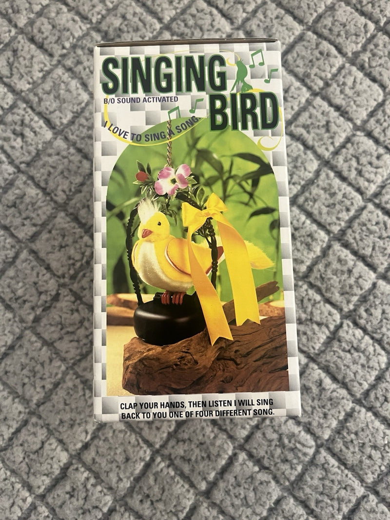 Battery-Operated Yellow Singing Bird Toy with Clap-Activated Sound, Chain, and Perch
