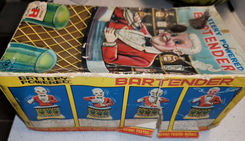 Battery-Operated Mechanical Tin Bartender Toy with Working Smoke and Dark Skin Design