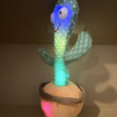 Interactive Light-Up Plush Cactus Toy with Music and Motion for Kids 3-11
