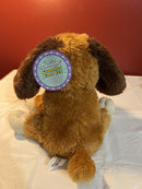 Interactive Singing Dog with Flapping Ears and Twistable Features