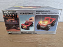 Classic Black Battery-Operated Tumble Buggy with Blinking Headlights and Original Box