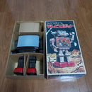 Retro Japanese Robot Toy with Illuminated Chest and Boxed Design