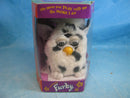 1998 Tiger Electronics Black & White Spotted Plush with Green Eyes Model 70-800