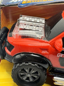 Ford F-150 Rev 'N Rock Motorized Truck Toy with Lights and Sounds
