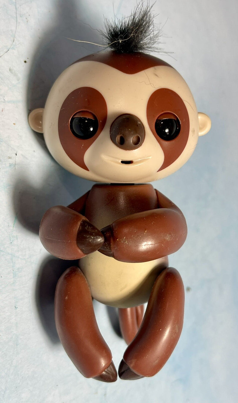 WowWee Fingerlings Baby Sloth Interactive Talking and Moving Toy Brown