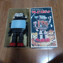 Retro Japanese Robot Toy with Illuminated Chest and Boxed Design