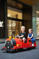 Kids Ride-On Train for Backyard Fun – Battery Powered W/Magic Cars® Remote Control, Real Steam Stack, MP3 & Working Caboose (Ages 1–10)