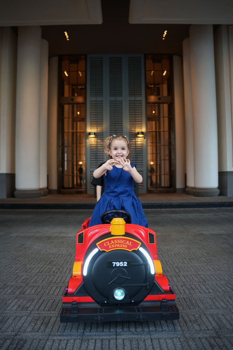 Kids Ride-On Train for Backyard Fun – Battery Powered W/Magic Cars® Remote Control, Real Steam Stack, MP3 & Working Caboose (Ages 1–10)