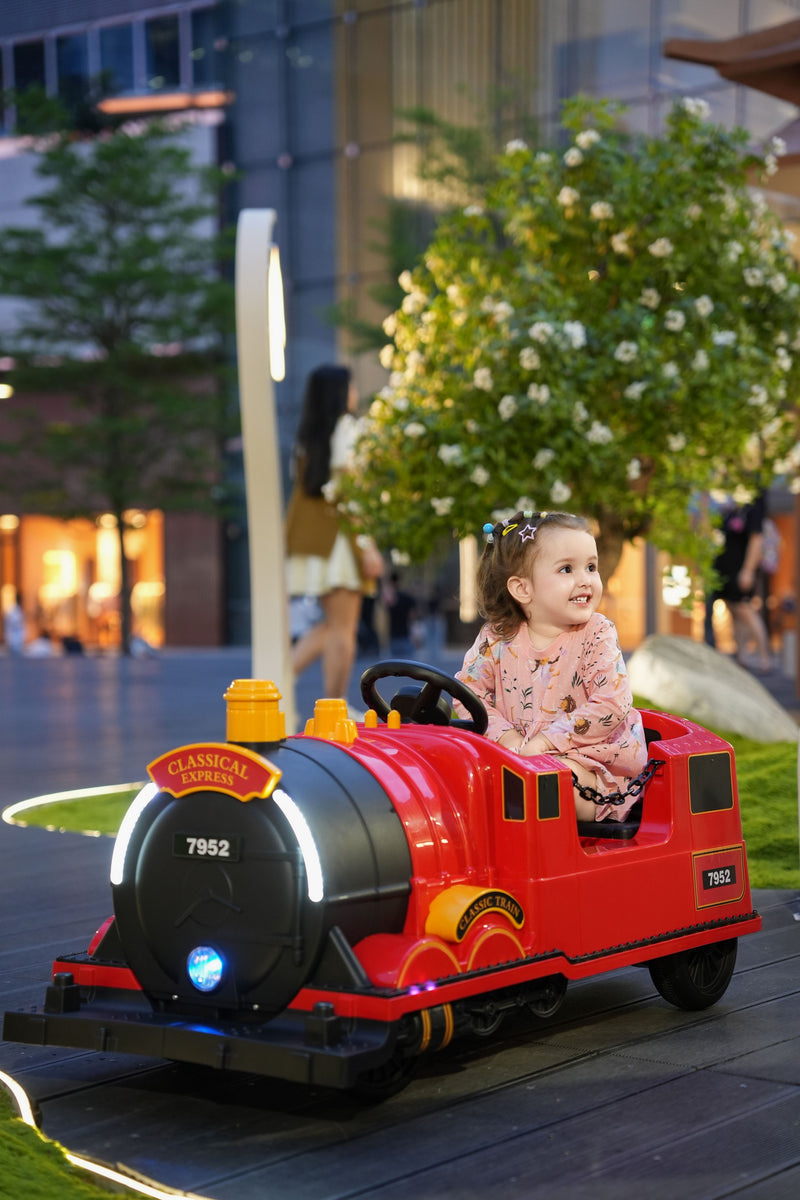 Kids Ride-On Train for Backyard Fun – Battery Powered W/Magic Cars® Remote Control, Real Steam Stack, MP3 & Working Caboose (Ages 1–10)