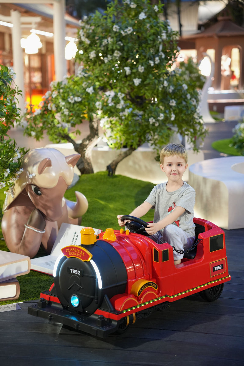 Kids Ride-On Train for Backyard Fun – Battery Powered W/Magic Cars® Remote Control, Real Steam Stack, MP3 & Working Caboose (Ages 1–10)