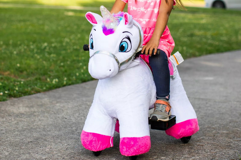 Unicorn 6v plush ride on hotsell